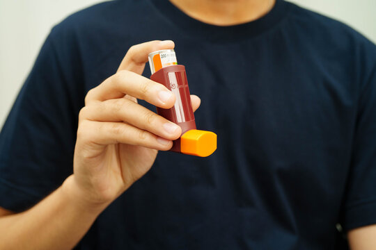 Bangkok, Thailand May 4, 2026 Asthma and chronic obstructive pulmonary disease COPD, Asian teenage using metered dose inhaler MDI.