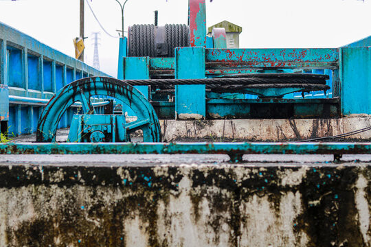 Heavy Industrial Horizontal Cable Pulley Wheel on Concrete Barrage Wall
