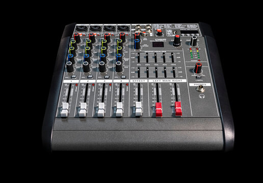 Close-up of amplifier, sound mixer for audio recording on black background with clipping path.