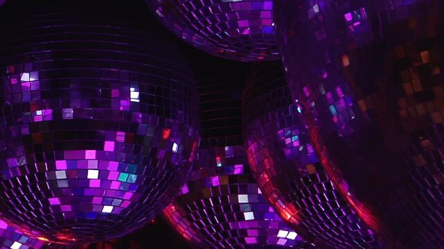 Celebrate a spectacular birthday under a canopy of luminous disco balls. Watch vibrant green, red, blue, and purple light reflections dance, transforming the venue into a joyous nighttime party haven.