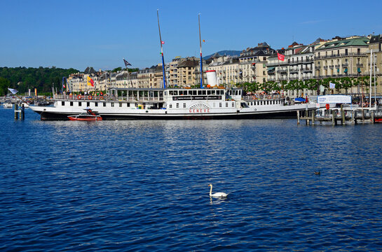 Geneva, Switzerland, Europe - 05.2022 : MS Gen&egrave;ve - oldest paddle ship of Lake Geneva, presently unserviceable but still aflot moored at Eaux-Vives dock, used as restaurant - Buvette du Bateau