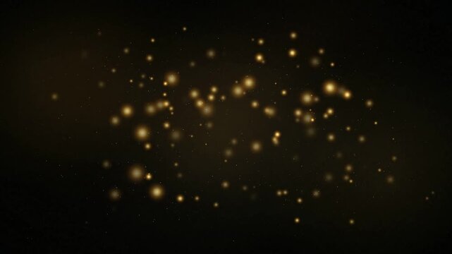 abstract golden sparkle light particles glowing on bokeh on dark background 