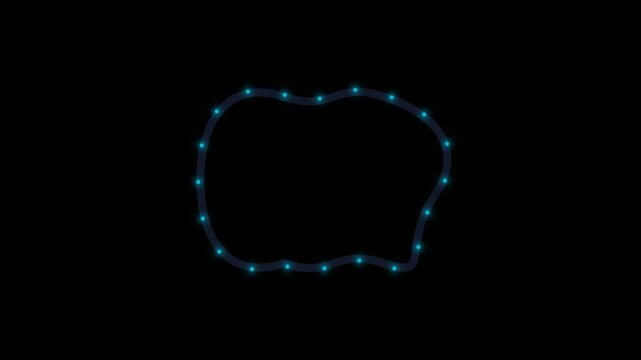 Abstract glowing blue light particles forming a circular frame on black background.