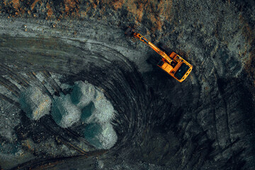 Aerial View of Excavator Working at Open Pit Mining and Earthmoving Site © William