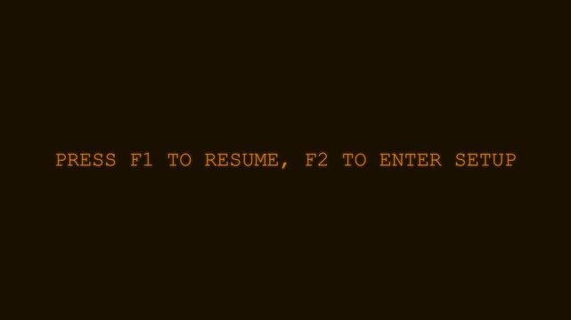 Computer BIOS Boot Error Screen Prompting User Action.