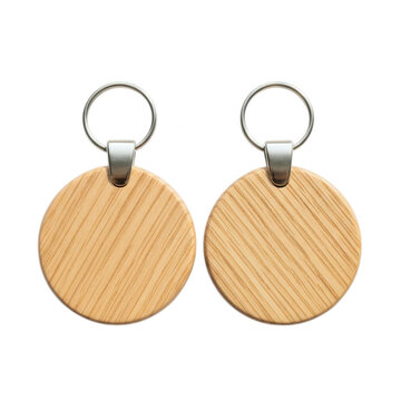 Pair of round wooden keychains with metal rings isolated on transparent background for custom gift shop display