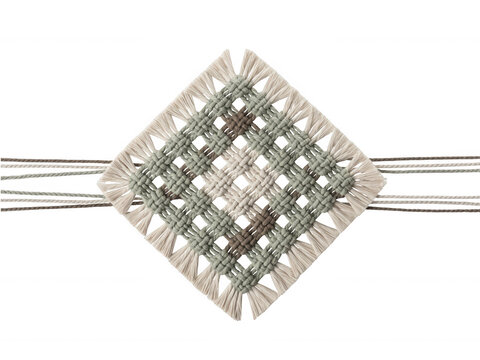 Handmade woven macrame square pattern isolated on transparent background for interior decor and textile design