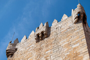 Medieval stone battlements reaching into a clear sky The Concept of European history © VicVaz