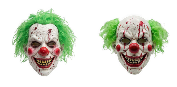 Two scary clown masks with green hair and blood splatters isolated on transparent background