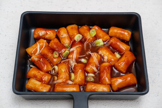 Close up spicy Korean Tteokbokki rice cake in pan