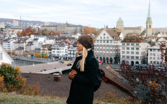 Young Female Tourist Enjoying Panoramic View of Zurich City Center in Autumn, Switzerland