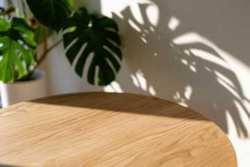 Fototapeta premium The Wooden Table in Sunlit Corner with Plant Shadows and Warm Natural Light