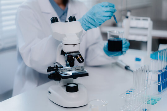 Scientists research biochemicals in a laboratory to advance health care innovation