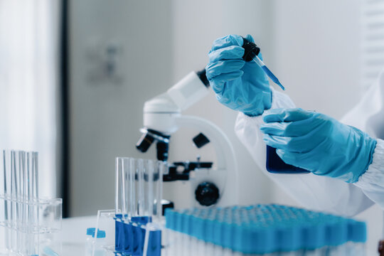 Scientists research biochemicals in a laboratory to advance health care innovation