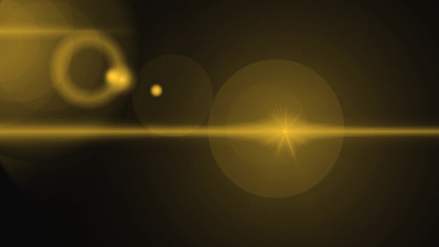 Golden optical lens flare with multiple bokeh rings and sharp horizontal streak against black background for cinematic lighting design and creative photo manipulation and digital art overlays