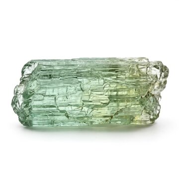Pale green aquamarine beryl crystal on white background.