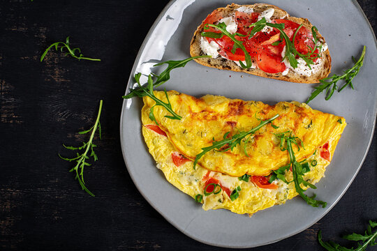 Protein Rich Breakfast with Vegetable Omelette and Fresh Sandwich. Top view