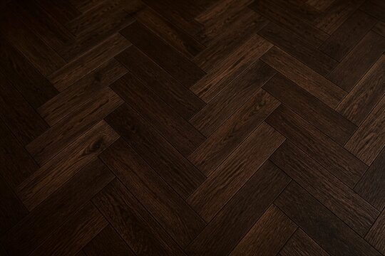 Dark wood herringbone parquet flooring texture in interior