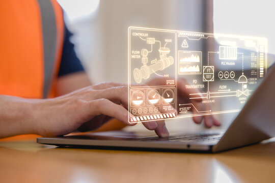Industrial worker using a smartphone with digital interface for smart factory automation, IoT monitoring, cloud technology, data control, engineering systems modern industrial operations.
