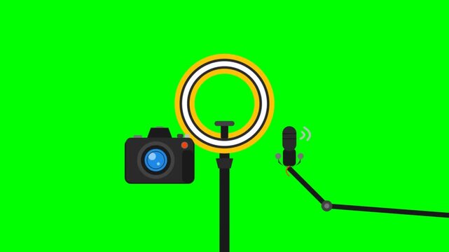 Digital camera ring light and microphone setup for broadcasting against a bright green screen