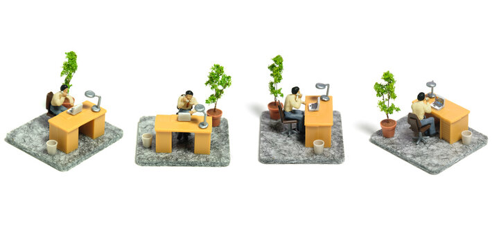 Miniature tiny people toy figure photography. Workspace station layout design concept. A businessmen seat on his desk, working his job while make a phone call. Isolated on a white background