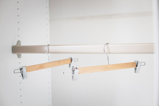 Empty closet rod with simple design, clean lines

