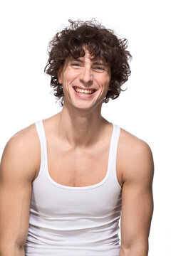 Portrait of mid adult man against white background, smiling