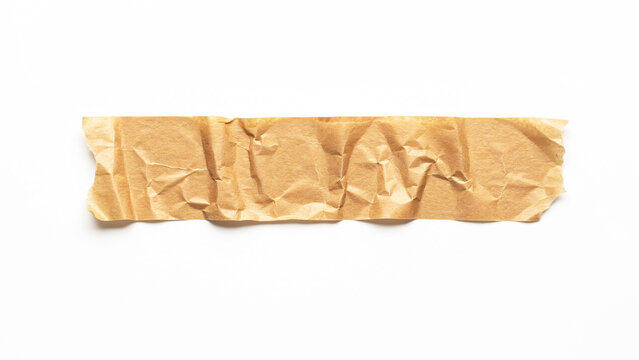 Crumpled brown paper texture with natural wrinkles and creases on transparent background