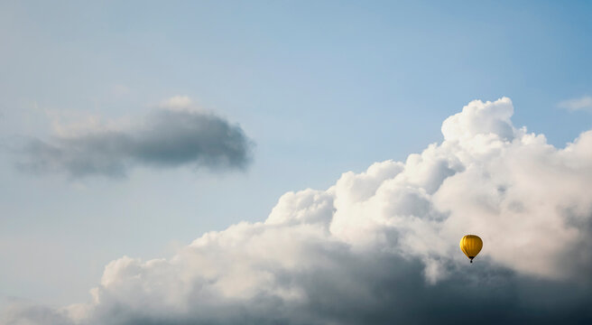 Austria, Hot air balloon at Oberhofen against cloudy sky
