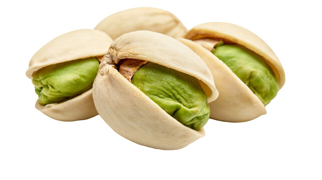 Several shelled pistachios with vibrant green kernels, isolated on transparent background