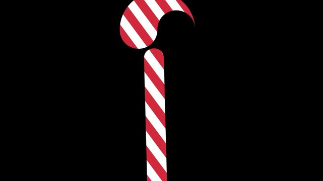 A single striped candy cane isolated on a solid black background.
