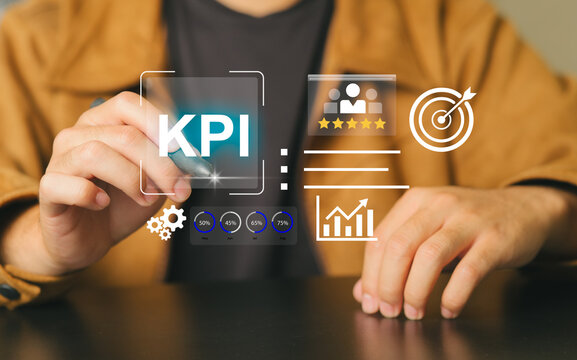 Business Person Analyzing Key Performance Indicators and Data Visualization