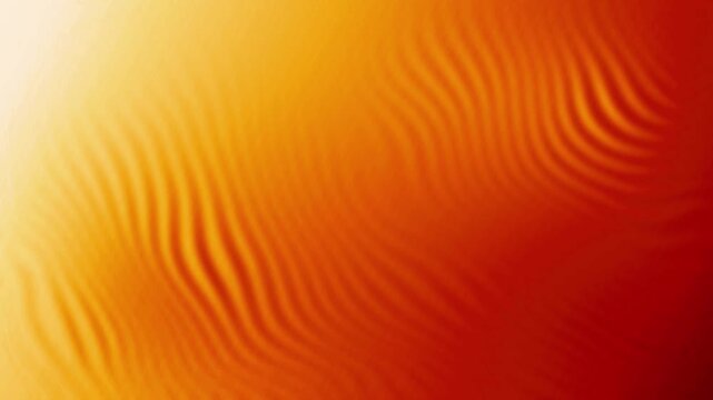 Orange gradient ripples flow and undulate in looping abstract motion graphic with glowing red and golden concentric wave patterns