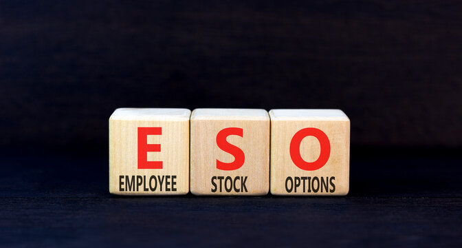 ESO employee stock options symbol. Concept words ESO employee stock options on beautiful wooden blocks. Beautiful black background. Business ESO employee stock options concept. Copy space.