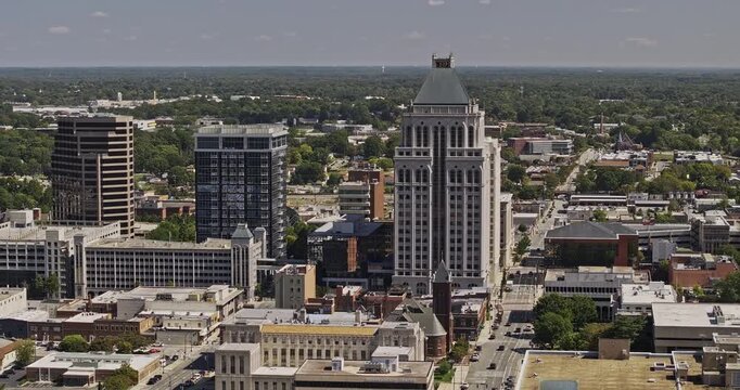Greensboro North Carolina Aerial v24 telephoto orbit around downtown office towers, rooftops and city blocks - Shot with Mavic 3 Pro Cine - Oct 1st 2023