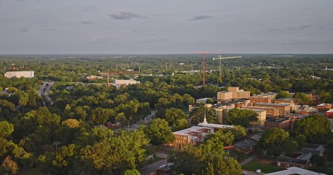 Raleigh North Carolina Aerial v25 low flyover from Dorothea Dix Park and Boylan Heights toward the Warehouse District and downtown at sunset - Shot with Inspire 3 8k - Sept 30th 2023