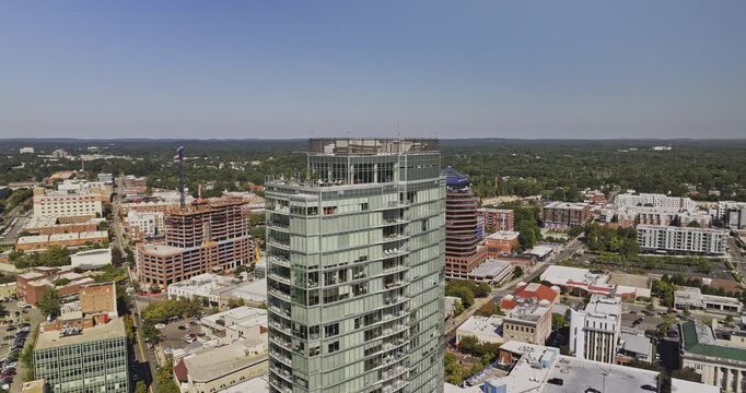 Durham North Carolina Aerial v10 low flyover from Central Park toward downtown high-rises and the rail corridor - Shot with Mavic 3 Pro Cine - Oct 1st 2023