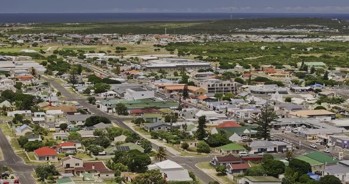 Gansbaai South Africa Aerial v24 telephoto flyover around the town center, residential neighborhoods and coastal harbor - Shot with Mavic 3 Pro Cine - Jan 8th 2024