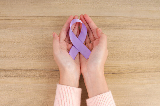Hand Showing Fabric Awareness Ribbon