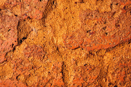Rough Orange Brick Surface Cracked Texture and Detailed Structure