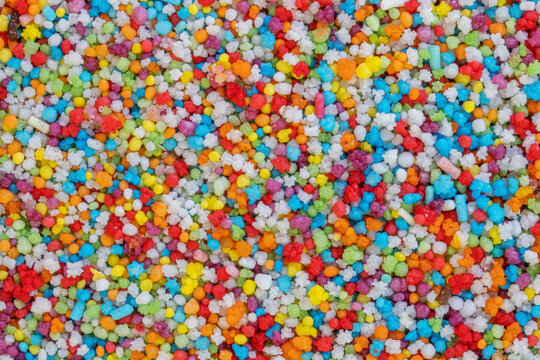 a vibrant macro shot of colorful candy sprinkles