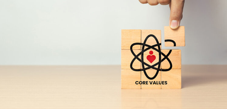 Core values, corporate values concept. Company culture and strategy related to business, people relationships, and company growth. Principles guiding company actions. Core values icon on wooden blocks