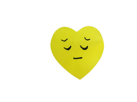 Sad yellow heart shape with closed eyes and unhappy face