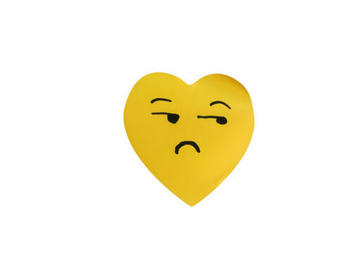 Yellow heart shape with a skeptical facial expression