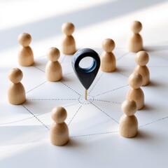 Obraz premium Concept of community connection and central location with wooden figures linked by dotted lines around a location marker on white surface
