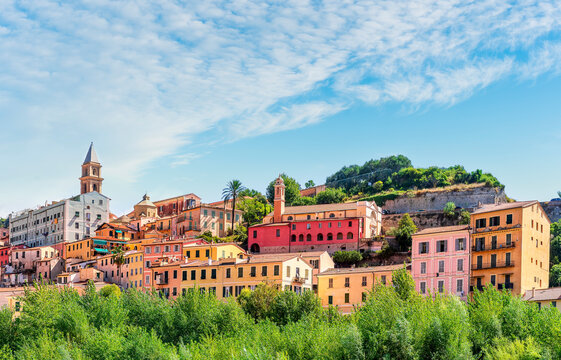 beautiful panoramic landscape of european colorful town in old vintage style with beautiful towers and facades in touristic summer season. Urban view of italian city during summer day on evening.