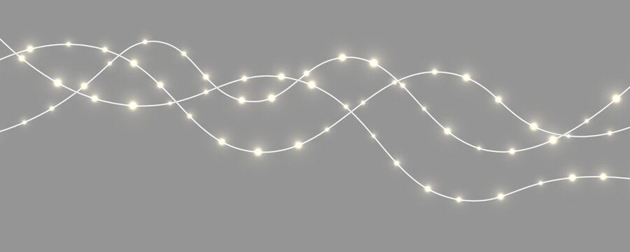 Christmas fairy string lights PNG with luminous warm bulbs. Soft glowing lights create a festive mood. Isolated decoration for design.