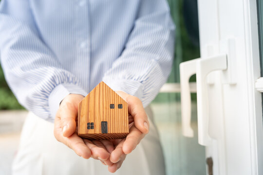 lease, rental and selling home. silhouette hand hold new house or real estate, rent house, Sales, loan credit financial, insurance, Seller, dealer, installment,  buy, sell, move in
