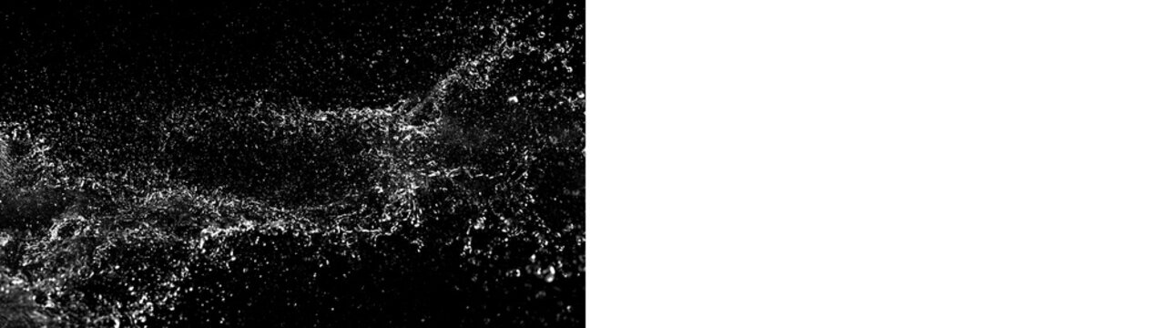 Horizontal water splash stream isolated on black and transparent background. Panoramic liquid spray overlay