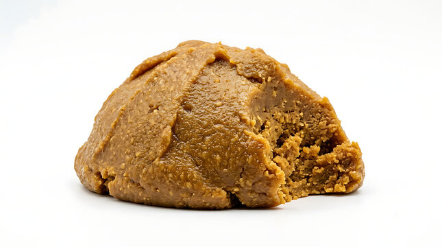 Mound of fermented miso paste isolated on a white background